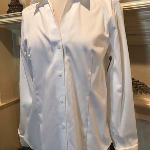 From the original Jones New York. The must have white shirt. Very flattering.